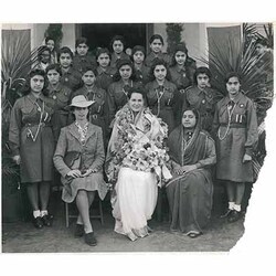Begum Aga Khan with Mrs Kin Quaid, Girl Guides and a teacher